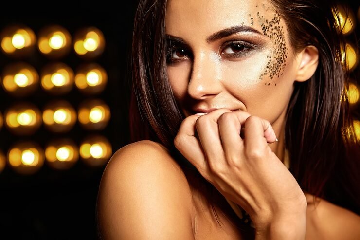 beautiful-girl-with-golden-glitter-face_158538-8546